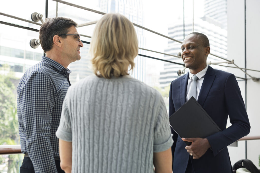 Sales professionals talking to a lead